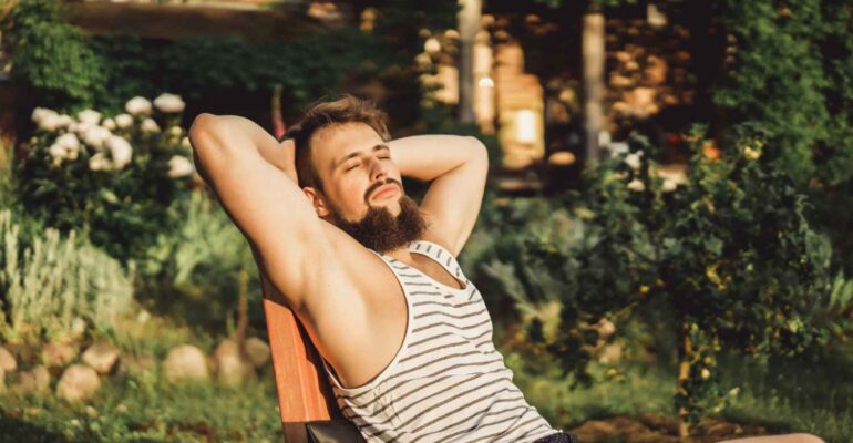 man-is-resting-country-house-bearded-man-enjoys-sunset-green-lawn_11zon